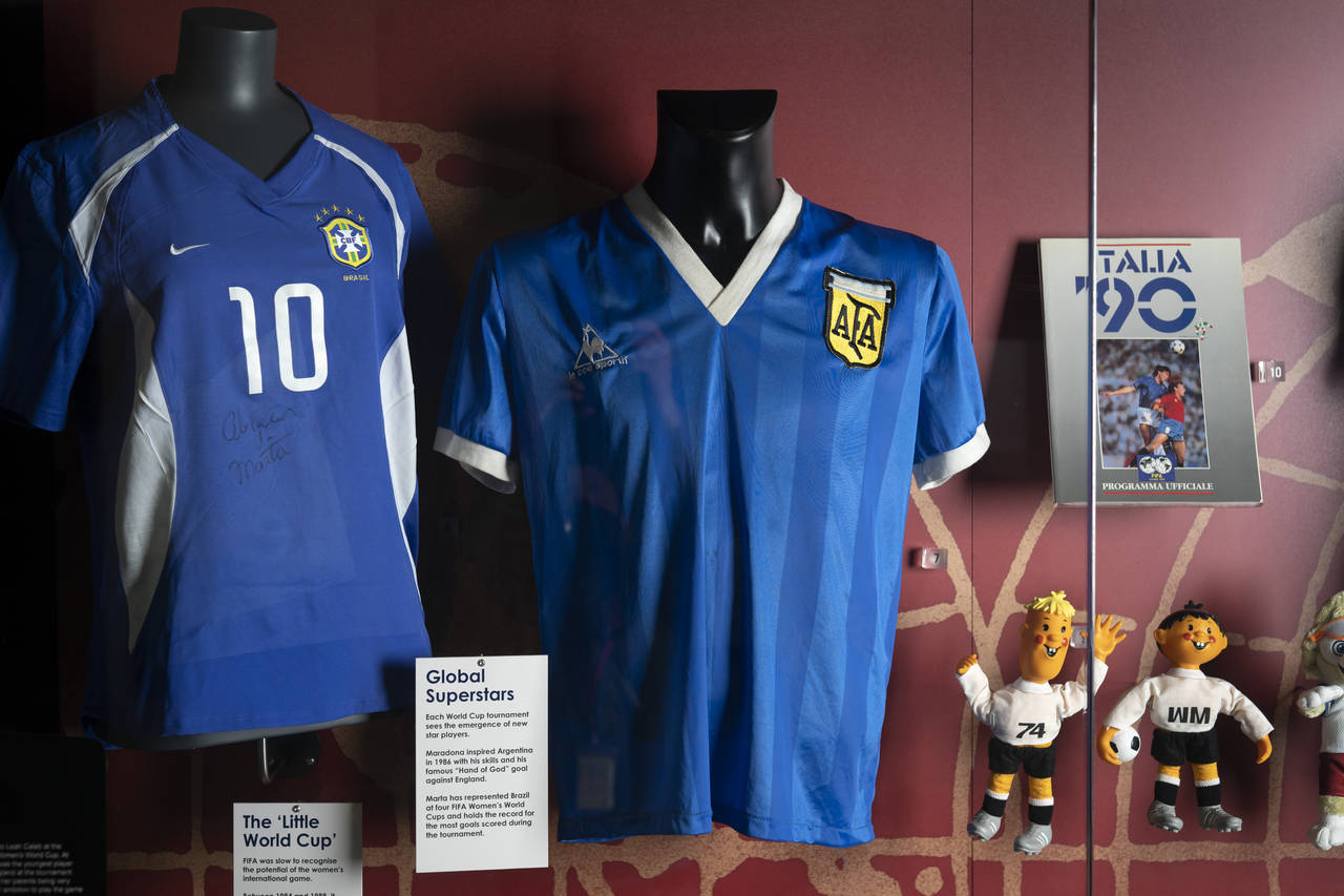 FILE - The soccer shirt, center, worn by Argentina's Diego Maradona in the 1986 World Cup quarterfi...