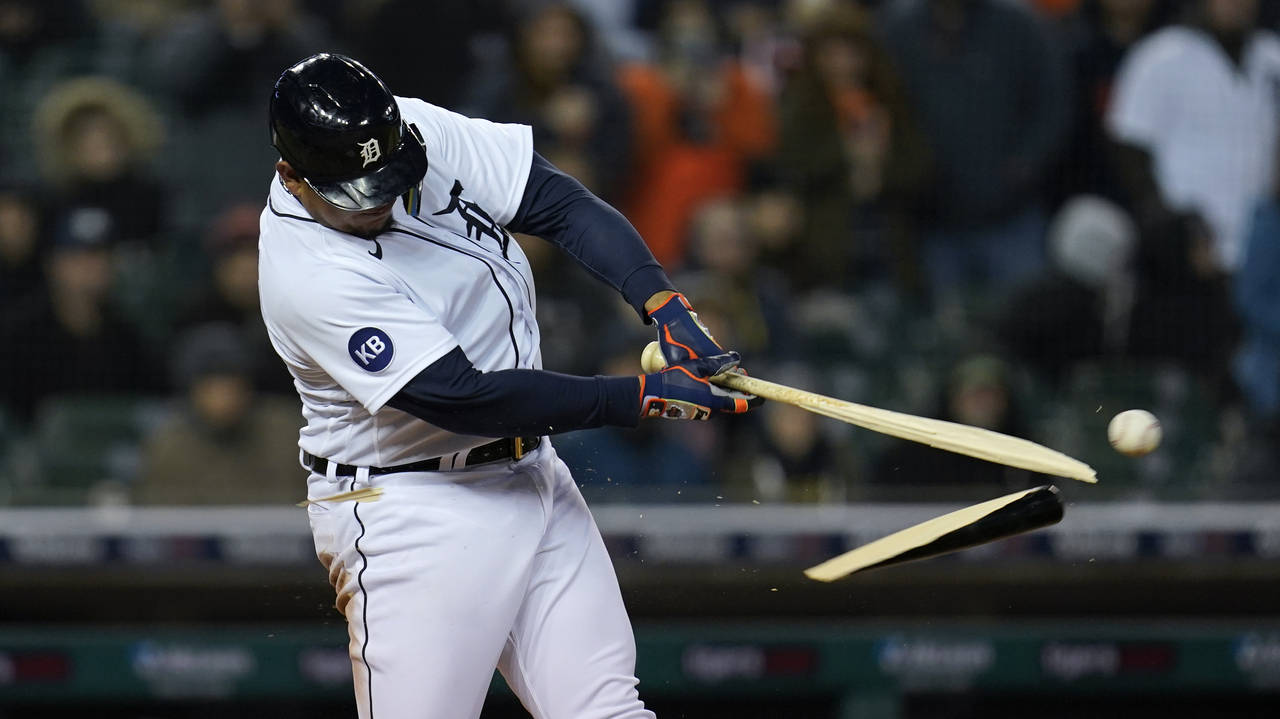 Detroit Tigers' Miguel Cabrera breaks his bat on a single against the New York Yankees in the sixth...