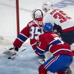 
              Washington Capitals right wing Anthony Mantha (39) slips the puck in under the glove of Montreal Canadiens goaltender Sam Montembeault (35) to score during the second period of an NHL hockey game Saturday, April 16, 2022, in Montreal. (Peter McCabe/The Canadian Press via AP)
            
