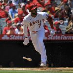 
              Los Angeles Angels' Jo Adell drops his bat as he hits a grand slam during the first inning of a baseball game against the Baltimore Orioles Sunday, April 24, 2022, in Anaheim, Calif. (AP Photo/Mark J. Terrill)
            