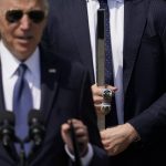 
              President Joe Biden speaks during an event to celebrate the Tampa Bay Lightning's 2020 and 2021 Stanley Cup championships at the White House, Monday, April 25, 2022, in Washington, as Steven Stamkos holds a hold stick behind Biden. (AP Photo/Andrew Harnik)
            