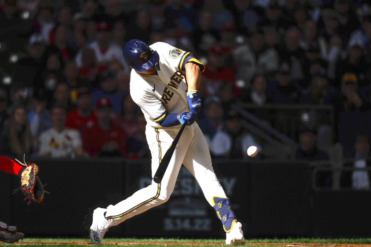 Milwaukee Brewers' Tyrone Taylor (15) hits a two-run double against the St. Louis Cardinals during ...