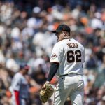 
              San Francisco Giants starting pitcher Logan Webb (62) reacts after ending the top half of the fourth inning of a baseball game against the Washington Nationals in San Francisco, Saturday, April 30, 2022. (AP Photo/John Hefti)
            