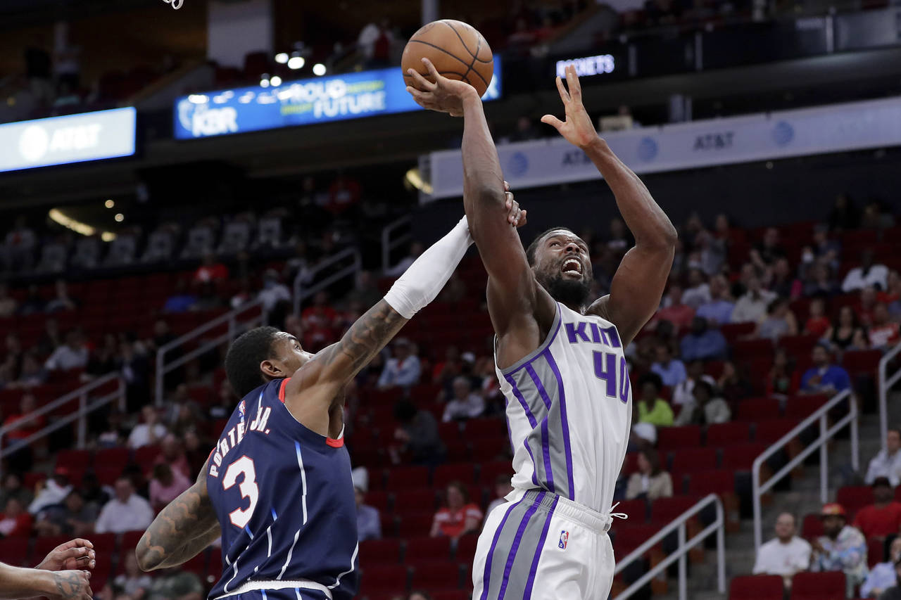 Sacramento Kings forward Harrison Barnes (40) is fouled on his shot attempt by Houston Rockets guar...