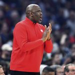 
              Atlanta Hawks coach Nate McMillan yells to players during the first half of the team's NBA play-in basketball game against the Cleveland Cavaliers on Friday, April 15, 2022, in Cleveland. (AP Photo/Nick Cammett)
            