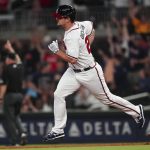 
              Atlanta Braves' Alex Dickerson runs the bases after hitting a two-run home run during the fourth inning of the team's baseball game against the Miami Marlins on Saturday, April 23, 2022, in Atlanta. (AP Photo/John Bazemore)
            