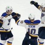 
              St. Louis Blues defenseman Torey Krug, left, is congratulated by Brayden Schenn (10) and Jordan Kyrou, right, after his goal off Boston Bruins goaltender Jeremy Swayman during the second period of an NHL hockey game, Tuesday, April 12, 2022, in Boston. (AP Photo/Charles Krupa)
            
