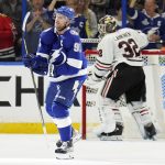 
              Tampa Bay Lightning center Steven Stamkos (91) celebrates after scoring past Chicago Blackhawks goaltender Kevin Lankinen (32) during the first period of an NHL hockey game Friday, April 1, 2022, in Tampa, Fla. (AP Photo/Chris O'Meara)
            