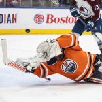 
              Edmonton Oilers goalie Mikko Koskinen (19) gives up a goal to the Colorado Avalanche during the third period of an NHL hockey game Saturday, April 9, 2022, in Edmonton, Alberta. (Jason Franson/The Canadian Press via AP)
            