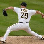 
              Pittsburgh Pirates relief pitcher Wil Crowe delivers during the ninth inning of a baseball game against the Chicago Cubs in Pittsburgh, Wednesday, April 13, 2022. The Pirates won 6-2, with Crowe recording his first major league save. (AP Photo/Gene J. Puskar)
            