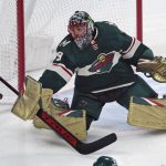 
              Minnesota Wild goalie Marc-Andre Fleury deflects a shot during the first period of the team's NHL hockey game against the Colorado Avalanche, Friday, April 29, 2022, in St. Paul, Minn. (AP Photo/Jim Mone)
            