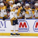 
              Nashville Predators left wing Filip Forsberg (9) celebrates his goal during the first period of an NHL hockey game against the Buffalo Sabres, Friday, April 1, 2022, in Buffalo, N.Y. (AP Photo/Jeffrey T. Barnes)
            