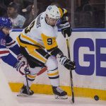 
              New York Rangers center Ryan Strome (16) chases Pittsburgh Penguins center Evan Rodrigues (9) during the first period of an NHL hockey game Thursday, April 7, 2022, in New York. (AP Photo/Bebeto Matthews)
            