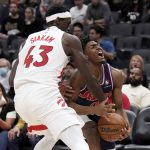 
              Toronto Raptors forward Pascal Siakam (43) defends against Philadelphia 76ers guard Tyrese Maxey (0) during the second half of Game 3 of an NBA basketball first-round playoff series, Wednesday, April 20, 2022, in Toronto. (Nathan Denette/The Canadian Press via AP)
            