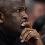 
              Atlanta Hawks coach Nate McMillan watches from the bench during the second half of the team's NBA play-in basketball game against the Charlotte Hornets Wednesday, April 13, 2022, in Atlanta. (AP Photo/John Bazemore)
            