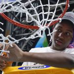 
              South Carolina's Aliyah Boston cuts the net after a college basketball game in the final round of the Women's Final Four NCAA tournament against UConn Sunday, April 3, 2022, in Minneapolis. South Carolina won 64-49 to win the championship. (AP Photo/Eric Gay)
            