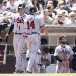 
              Atlanta Braves' Matt Olson, left, and Adam Duvall celebrate after Duvall scored on an RBI-single by Manny Pina during the fourth inning of a baseball game against the San Diego Padres in San Diego, Saturday, April 16, 2022. (AP Photo/Kyusung Gong)
            