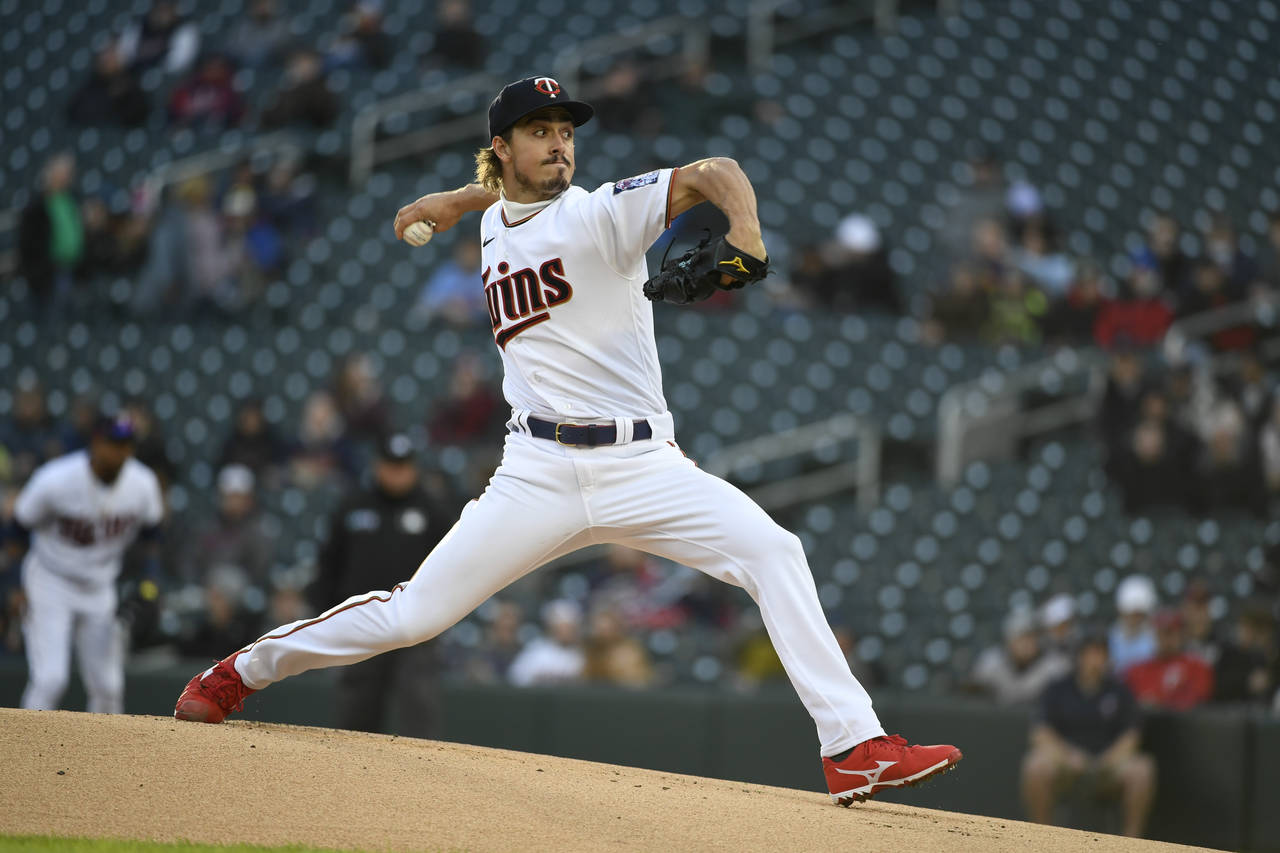 Minnesota Twins pitcher Joe Ryan throws against the Detroit Tigers during the first inning of a bas...