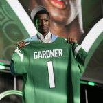 
              Cincinnati cornerback Ahmad Gardner poses for photos after being picked by the New York Jets with the fourth pick of the NFL football draft Thursday, April 28, 2022, in Las Vegas. (AP Photo/John Locher )
            
