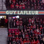 
              The name of the late hockey legend Guy Lafleur, who died Friday, is seen on an LED display during a moment of silence before an NHL hockey game between the Ottawa Senators and the Montreal Canadiens in Ottawa, Ontario on Saturday, April 23, 2022. Lafleur, among the sport's all-time greats, died at age 70 following a battle with lung cancer. (Justin Tang/The Canadian Press via AP)
            