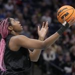 
              South Carolina's Aliyah Boston shoots during a practice session for a college basketball game in the final round of the Women's Final Four NCAA tournament Saturday, April 2, 2022, in Minneapolis. (AP Photo/Charlie Neibergall)
            