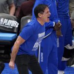 
              Dallas Mavericks team owner Mark Cuban cheers on his team late in the second half of Game 1 of an NBA basketball first-round playoff series against the Utah Jazz, Saturday, April 16, 2022, in Dallas. (AP Photo/Tony Gutierrez)
            