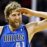 
              FILE - Dallas Mavericks power forward Dirk Nowitzki celebrates after scoring his 25,000 career point during the first half of an NBA basketball game against the New Orleans Hornets in New Orleans, April 14, 2013. (AP Photo/Jonathan Bachman, File)
            