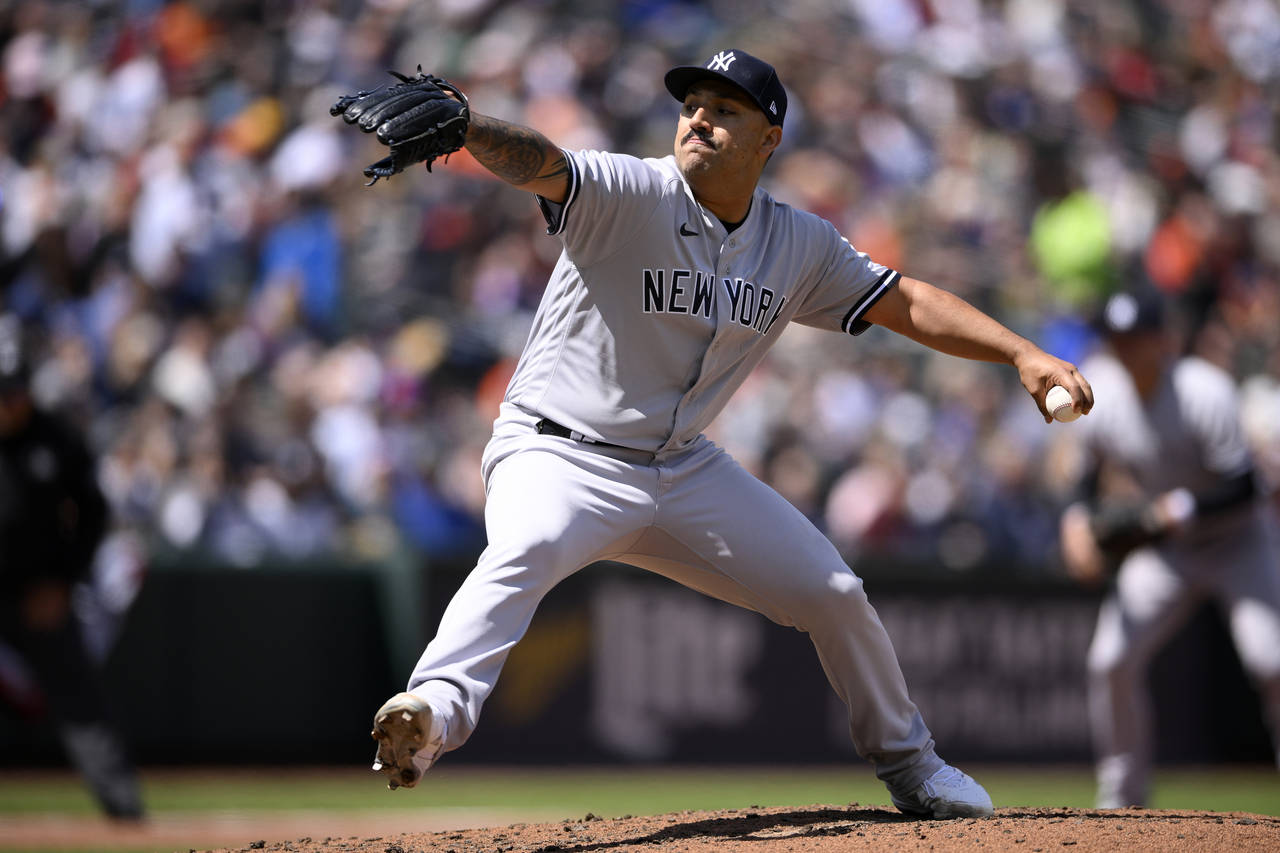 New York Yankees starting pitcher Nestor Cortes delivers during the third inning of a baseball game...
