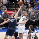 
              Dallas Mavericks forward Maxi Kleber (42) and Utah Jazz forward Juancho Hernangomez (41) compete for a rebound in the first half of Game 1 of an NBA basketball first-round playoff series, Saturday, April 16, 2022, in Dallas. (AP Photo/Tony Gutierrez)
            
