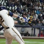 
              Milwaukee Brewers' Christian Yelich hits a grand slam during the fourth inning of a baseball game against the Pittsburgh Pirates Monday, April 18, 2022, in Milwaukee. (AP Photo/Morry Gash)
            