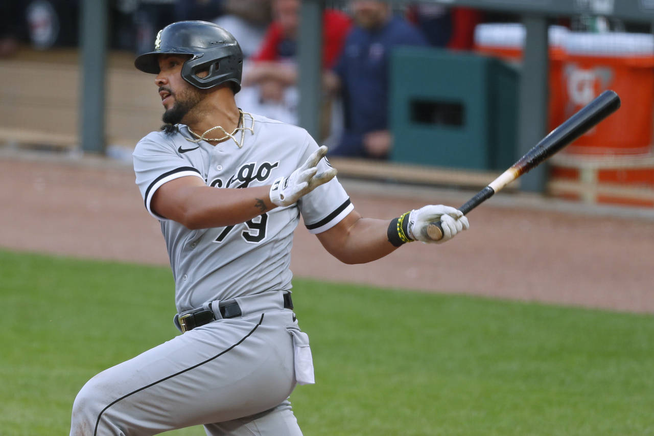 Chicago White Sox's Jose Abreu hits an RBI groundout during the eighth inning of the team's basebal...