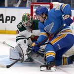 
              St. Louis Blues' Robert Thomas, right, is unable to score past Minnesota Wild goaltender Cam Talbot during the second period of an NHL hockey game Saturday, April 16, 2022, in St. Louis. (AP Photo/Jeff Roberson)
            