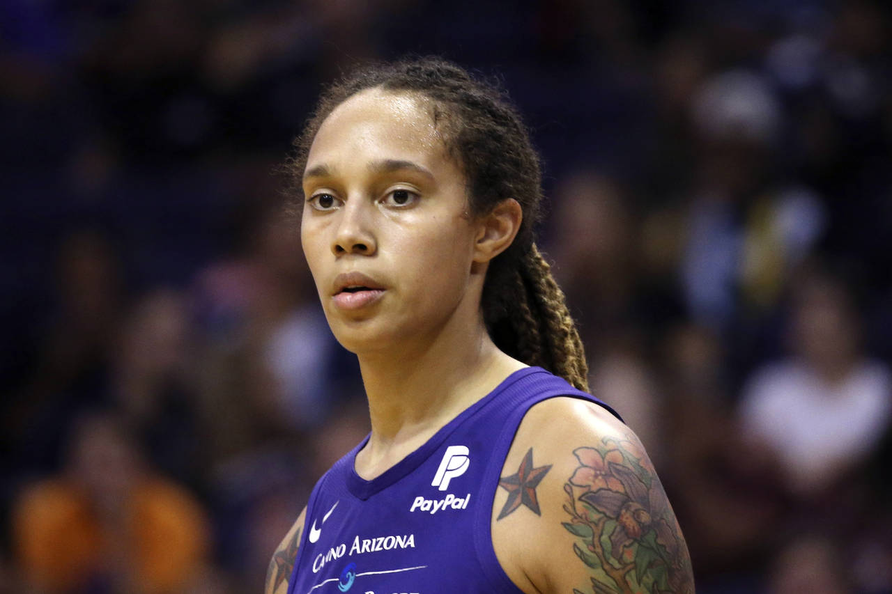 FILE - Phoenix Mercury center Brittney Griner pauses on the court during the second half of a WNBA ...