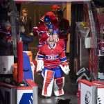 
              Montreal Canadiens goaltender Carey Price (31) leads the team onto the ice just prior to an NHL hockey game against the New York Islanders in Montreal, Friday, April 15, 2022. (Graham Hughes/The Canadian Press via AP)
            