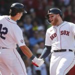 
              Boston Red Sox's Alex Verdugo, right, celebrates his solo home run with Bobby Dalbec during the second inning of a baseball game against the Minnesota Twins, Friday, April 15, 2022, in Boston. (AP Photo/Michael Dwyer)
            