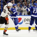 
              Tampa Bay Lightning center Anthony Cirelli (71) celebrates his overtime goal against the Anaheim Ducks with left wing Alex Killorn (17) and left wing Pierre-Edouard Bellemare (41) during an NHL hockey game Thursday, April 14, 2022, in Tampa, Fla. (AP Photo/Chris O'Meara)
            
