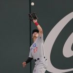 
              Chicago Cubs' Seiya Suzuki (27), of Japan, catches a fly ball hit by Atlanta Braves third baseman Austin Riley (27) in the eighth inning of a baseball game, Tuesday, April 26, 2022, in Atlanta. (AP Photo/Brynn Anderson)
            
