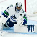 
              Vancouver Canucks goaltender Jaroslav Halak makes a save on a shot by the Arizona Coyotes during the first period of an NHL hockey game Thursday, April 7, 2022, in Glendale, Ariz. (AP Photo/Ross D. Franklin)
            