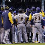 
              Milwaukee Brewers and Chicago Cubs benches clear after Milwaukee Brewers' Andrew McCutchen was hit by a pitch from Chicago Cubs relief pitcher Keegan Thompson during the eighth inning of a baseball game in Chicago, Saturday, April 9, 2022. (AP Photo/Nam Y. Huh)
            