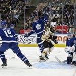 
              Toronto Maple Leafs' Wayne Simmonds (24) grabs the puck out of the air in front of the net during an NHL hockey game against the Boston Bruins in Toronto, Friday, April 29, 2022. (Aaron Vincent Elkaim/The Canadian Press via AP)
            