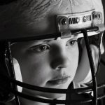 
              In a photo provided by Melissa Hutchinson, Aidan Hutchinson wears a Michigan football helmet. Jacksonville is expected to select Hutchinson with the No. 1 pick in the NFL draft on Thursday night, April 28. It's easy to see why the Jaguars would want him after watching what Hutchinson did last year at Michigan. Scouts who searched for more about his background found out Chris and Melissa raised a well-rounded son, uniquely shaped by a close-knit family that includes two older sisters. (Melissa Hutchinson via AP)
            