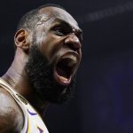 
              FILE - Los Angeles Lakers forward LeBron James celebrates after scoring and drawing a foul during the second half of an NBA basketball game against the Los Angeles Sunday, March 8, 2020, in Los Angeles. (AP Photo/Mark J. Terrill, File)
            