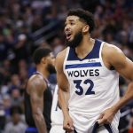 
              Minnesota Timberwolves center Karl-Anthony Towns (32) reacts to a foul call during the second quarter of the team's NBA basketball game against the Los Angeles Clippers on Tuesday, April 12, 2022, in Minneapolis. (AP Photo/Andy Clayton-King)
            