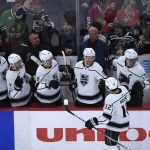 
              Los Angeles Kings' Trevor Moore (12) is congratulated for his goal during the first period of the team's NHL hockey game against the Chicago Blackhawks on Tuesday, April 12, 2022, in Chicago. (AP Photo/Paul Beaty)
            