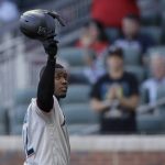 
              Miami Marlins' Jorge Soler tips his helmet to fans as he prepares to bat against the Atlanta Braves during the first inning of a baseball game Friday, April 22, 2022, in Atlanta. Soler was the World Series MVP while playing for the Braves in 2021. (AP Photo/Ben Margot)
            
