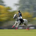 
              Azucena Uranga, member of the women's polo team from Argentina, tests a horse the day before the start the first Women's Polo World Championship in Pilar, Argentina, Friday, April 8, 2022. (AP Photo/Natacha Pisarenko)
            