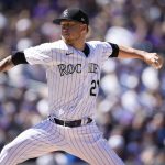 
              Colorado Rockies starting pitcher Kyle Freeland works against the Los Angeles Dodgers in the first inning of a baseball game Friday, April 8, 2022, in Denver. (AP Photo/David Zalubowski)
            