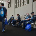 
              Ukrainian team members rest as they wait for what is known as "categorization", when organizers assess them and put them in groups of competitors with similar abilities, at the Invictus Games in The Hague, Netherlands, Thursday, April 14, 2022. The week-long games for active servicemen and veterans who are ill, injured or wounded opens Saturday in this Dutch city that calls itself the global center of peace and justice. Those concepts seem a world away to the team of 19 athletes from Ukraine. (AP Photo/Peter Dejong)
            
