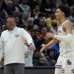 
              Kansas head coach Bill Self congratulates Jalen Wilson after making a shot during the first half of a college basketball game in the Sweet 16 round of the NCAA tournament Friday, March 25, 2022, in Chicago. (AP Photo/Nam Y. Huh)
            