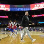 
              Kansas head coach Bill Self walks on the court during practice for the men's Final Four NCAA college basketball tournament, Friday, April 1, 2022, in New Orleans. (AP Photo/David J. Phillip)
            